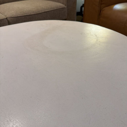 Close-up of a textured beige surface with a blurred background