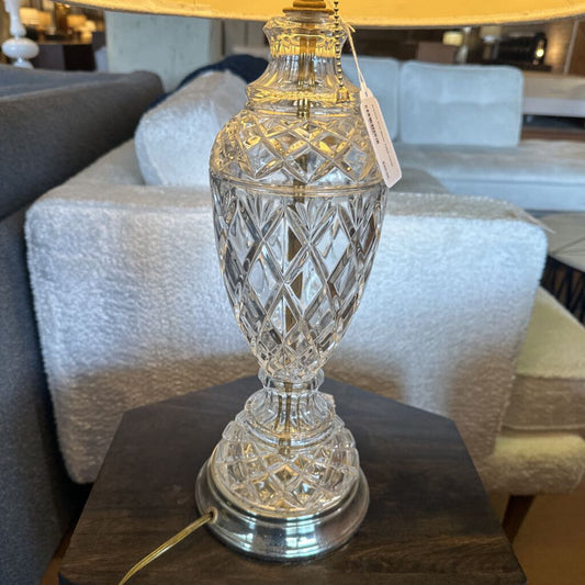 Crystal lamp on a table with a blurred indoor setting