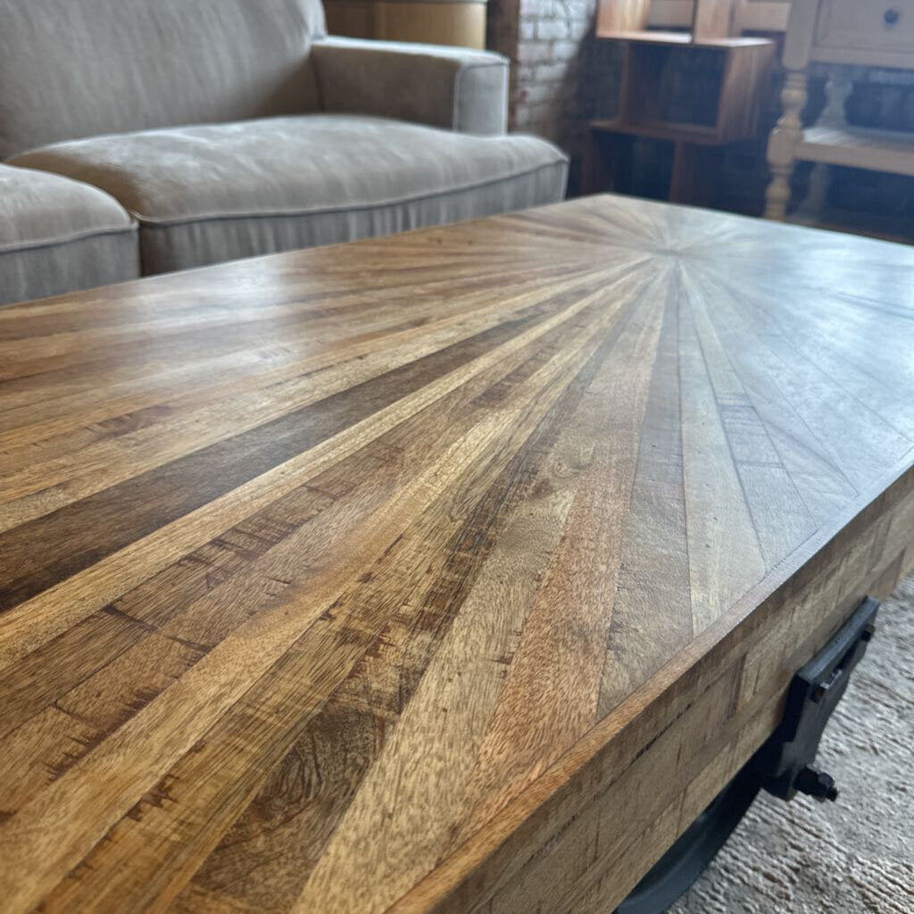 Wooden coffee table with a geometric pattern in a room setting