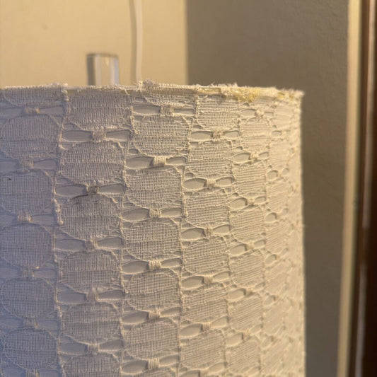 Close-up of textured fabric with a neutral background