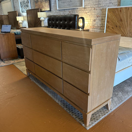 Wooden dresser in a room with furniture and decor