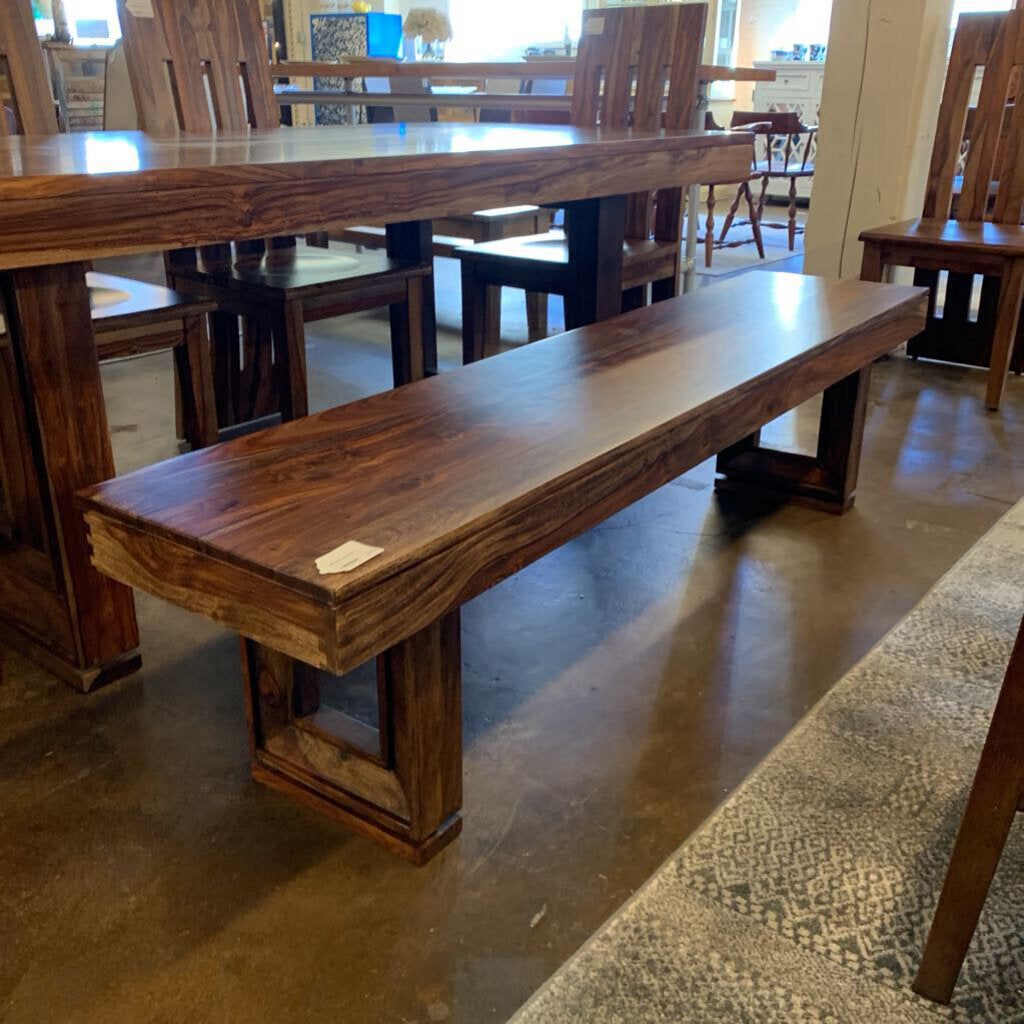 Wooden bench in a furniture store setting