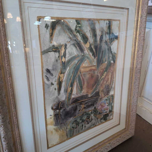 Framed abstract painting with a gold frame