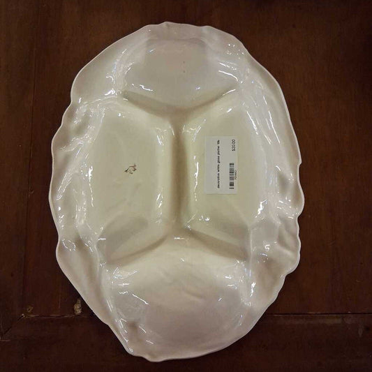 White ceramic three-section serving tray on a wooden surface