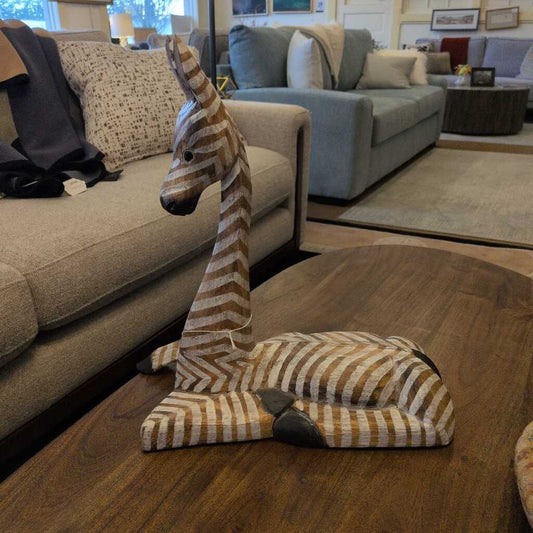 small giraffe statue