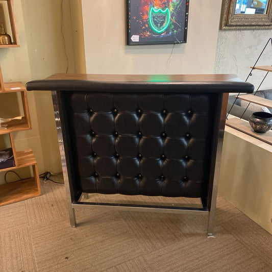 black leather and chrome bar