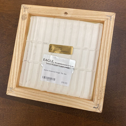 Wooden frame with a product labeled 'Eagle' on a wooden surface