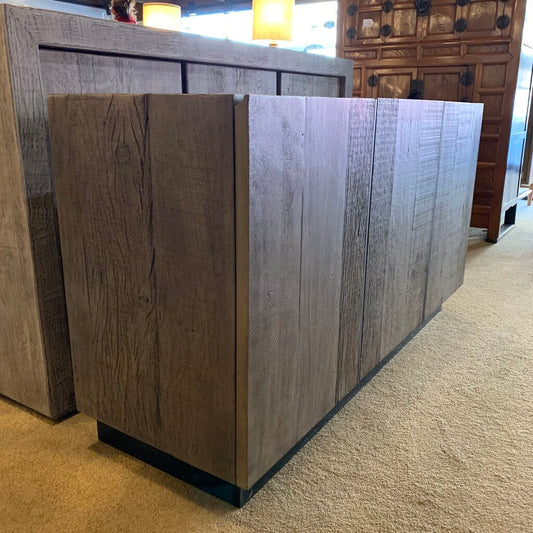 Wooden furniture pieces on display in a showroom
