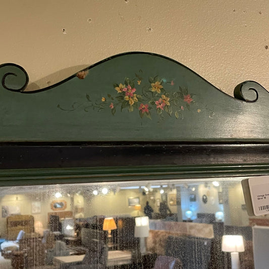 Decorative headboard with floral design on a wall