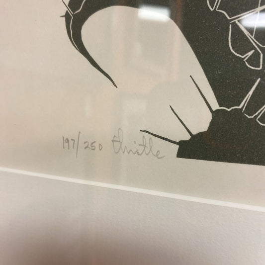 Silhouette artwork with signature and number on a plain background