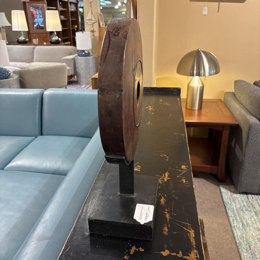 Rustic Wood Wheel Mounted On Black Stand
