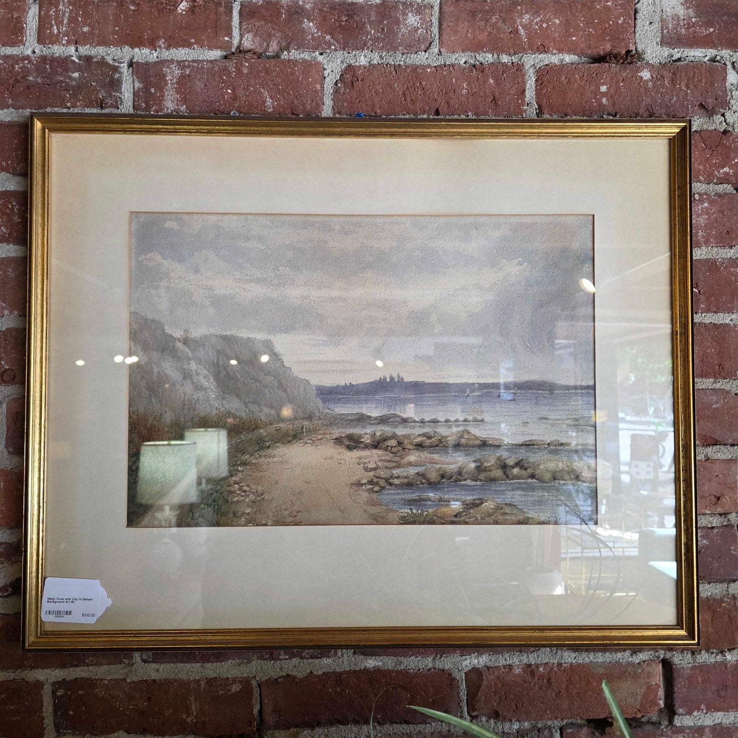 Misty Cove with City in Distant Background Art