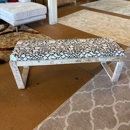 Bench with a unique patterned top in a room setting