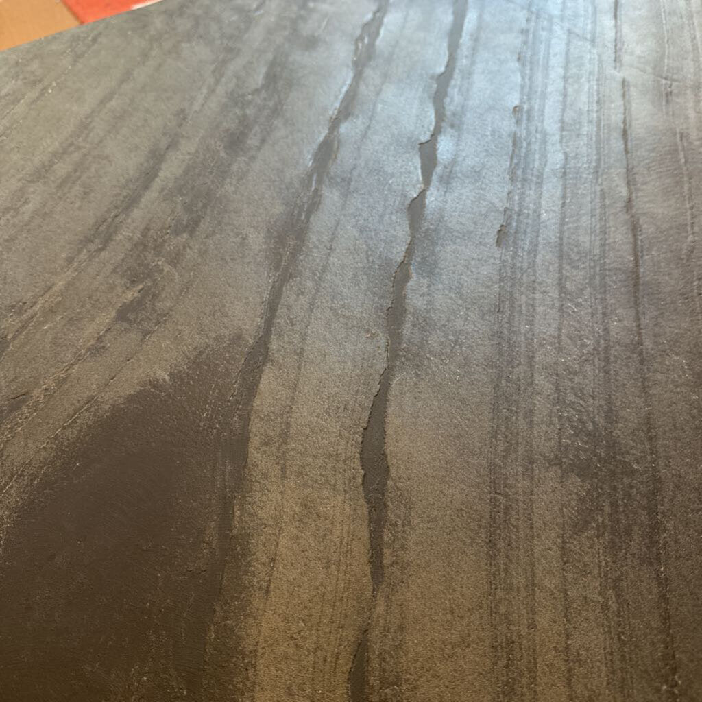 Close-up of a textured surface with brown and gray tones