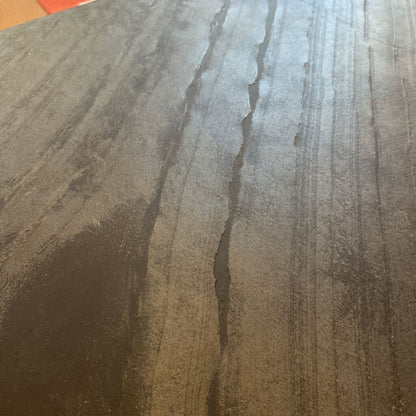 Close-up of a textured surface with brown and gray tones