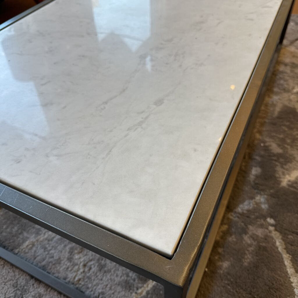 Close-up of a marble coffee table with a textured surface