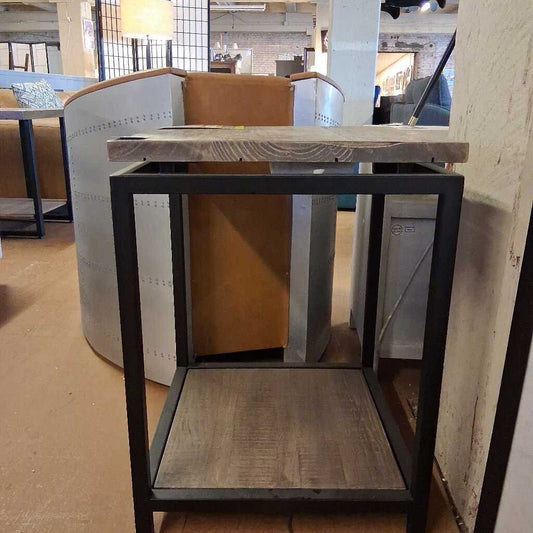 Wooden table with metal frame in a room setting