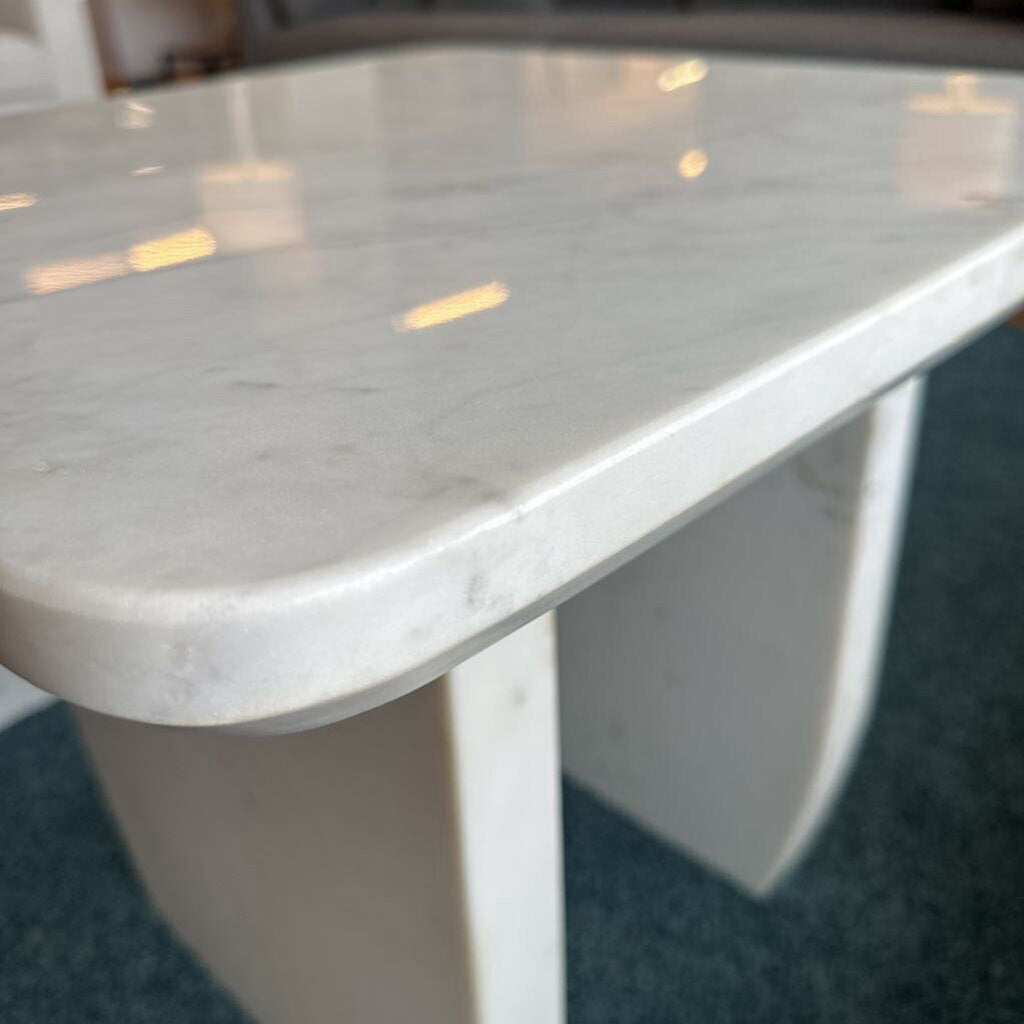 Close-up of a marble table with a blurred background