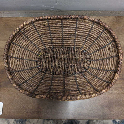 Woven basket on a wooden surface