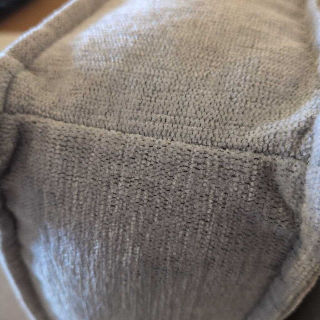 Close-up of a textured gray fabric surface