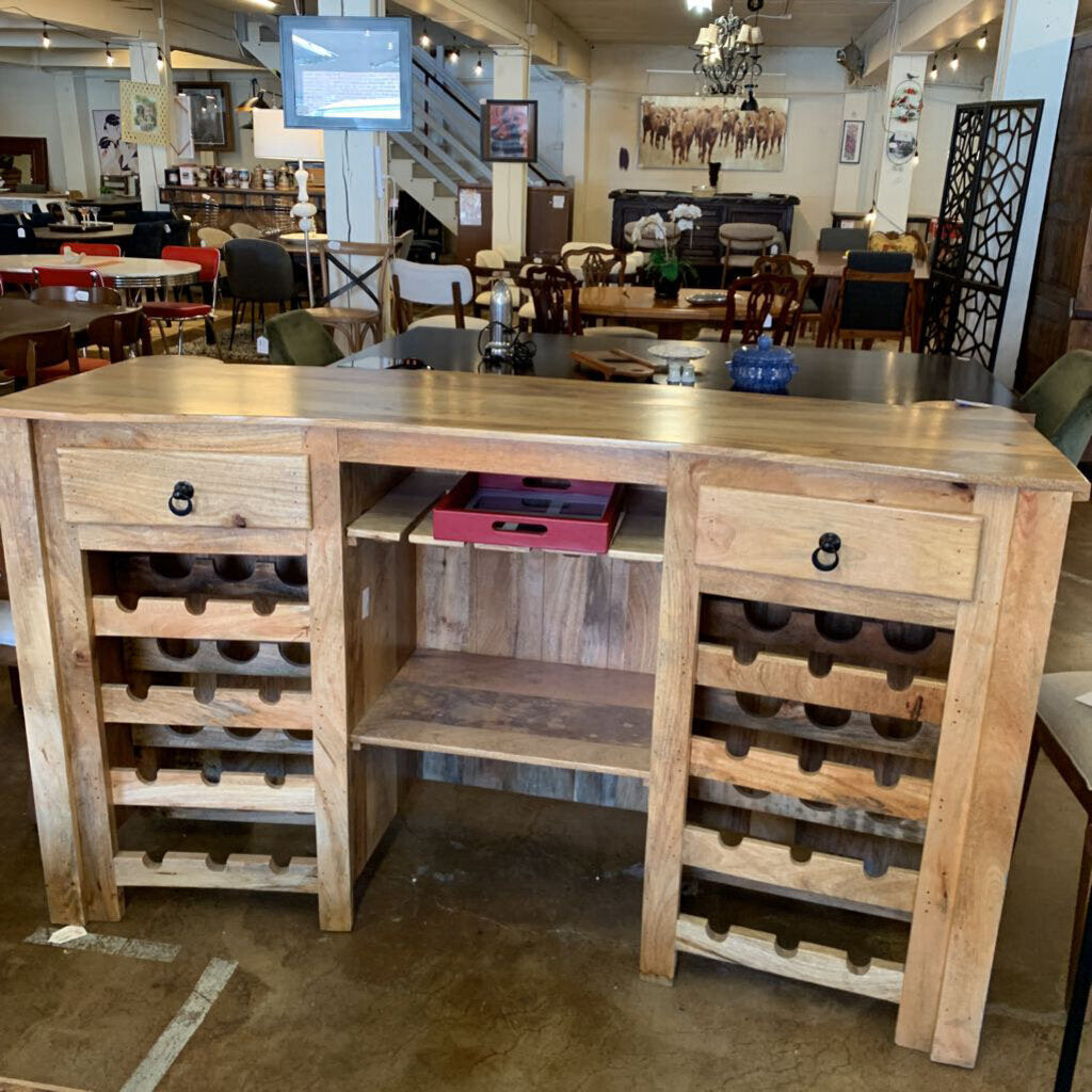 Wooden bar counter with wine storage in a showroom setting
