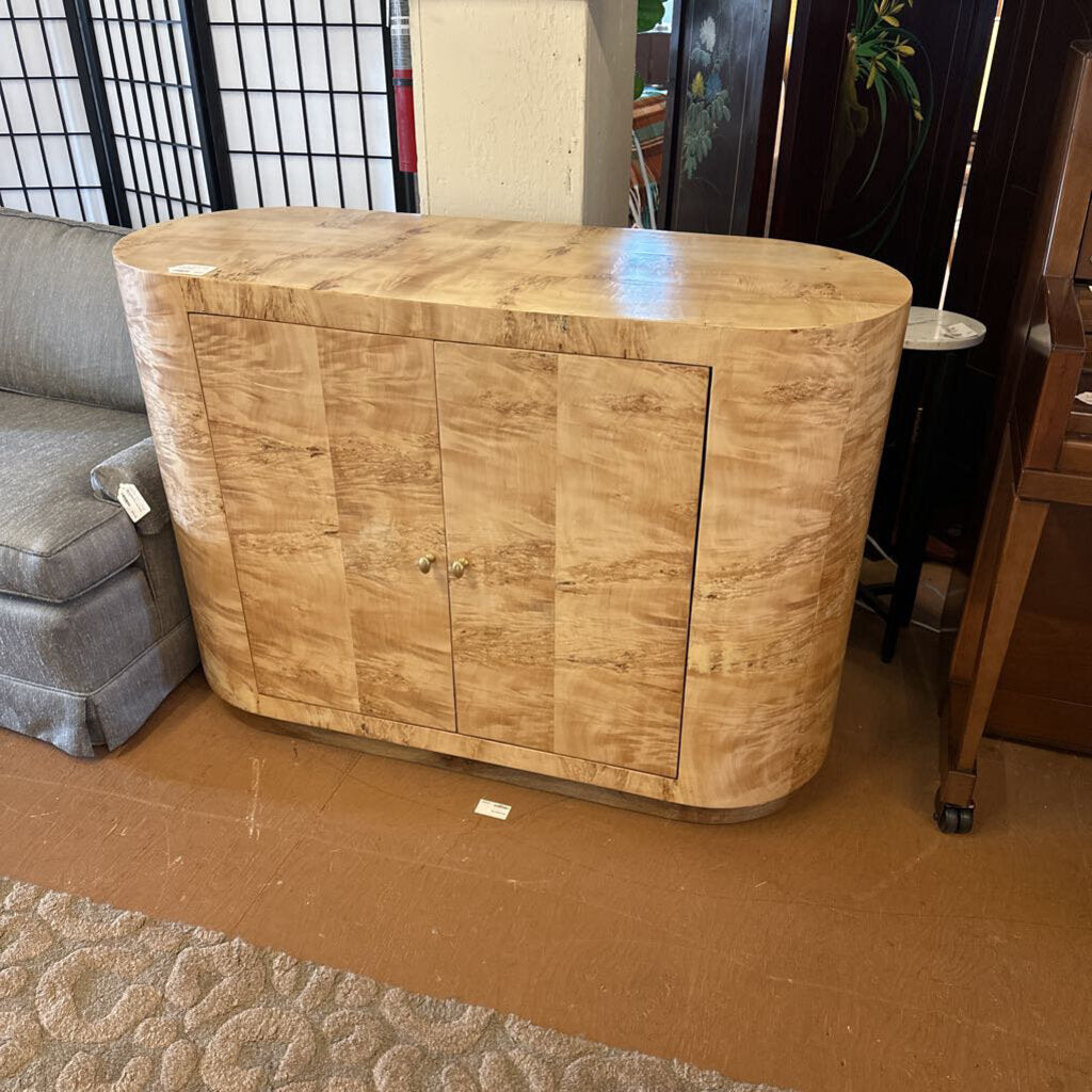 Wooden sideboard in a room with furniture and decor
