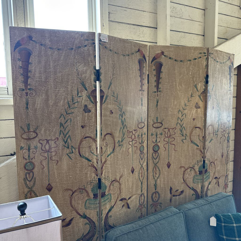 Decorative screen with floral patterns in a room setting