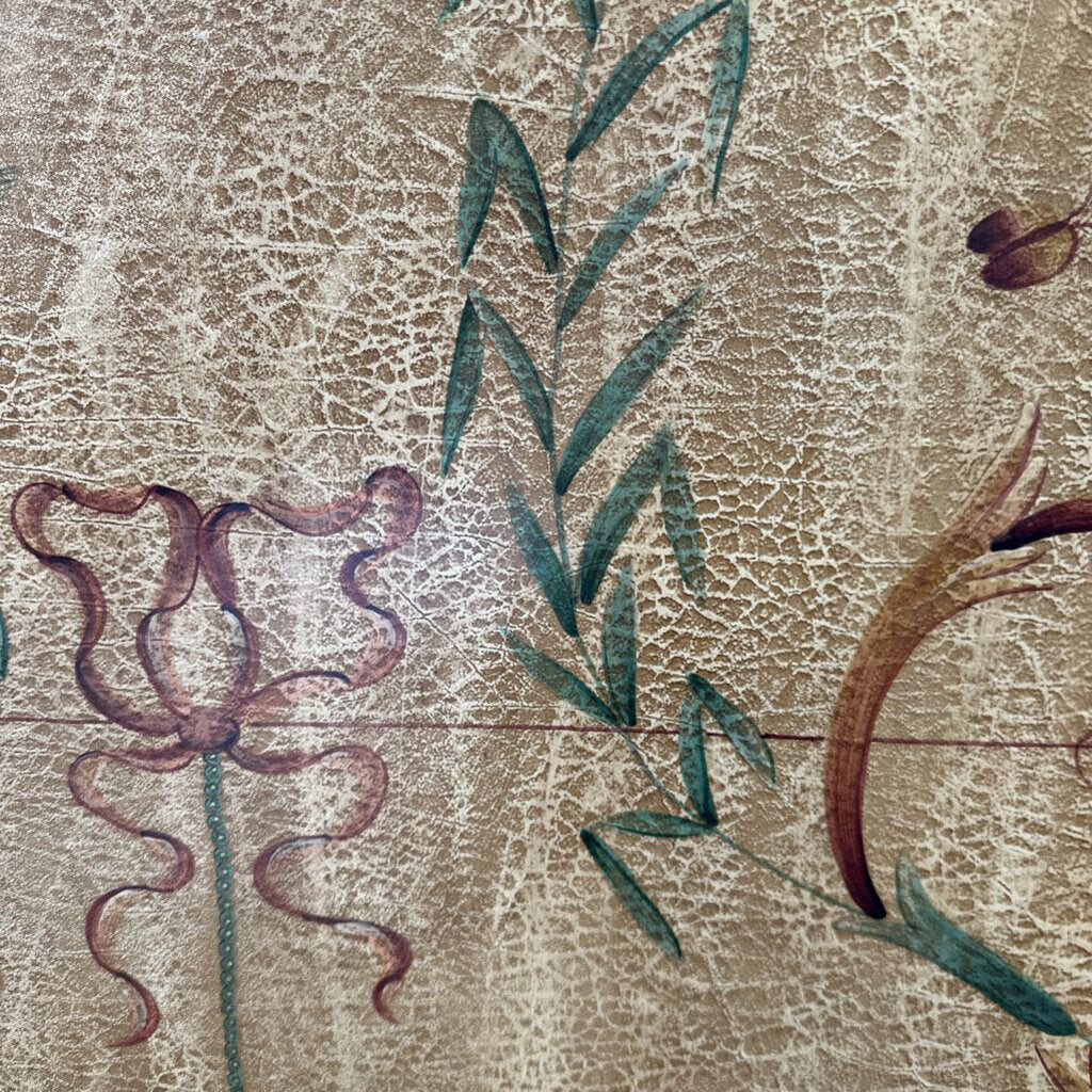 Decorative floral design on a textured beige background