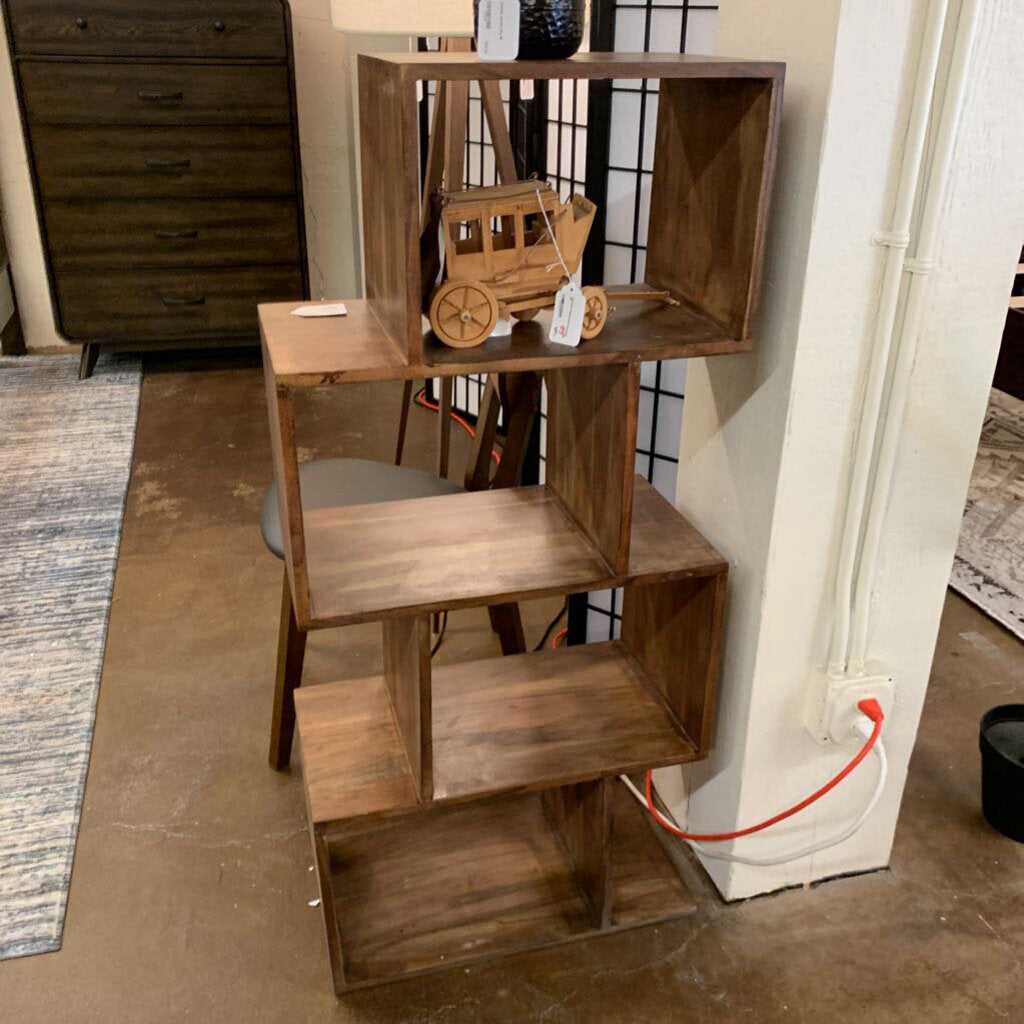Wooden step stool with shelves in a room setting