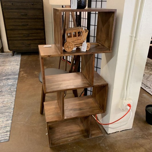 Wooden step stool with shelves in a room setting