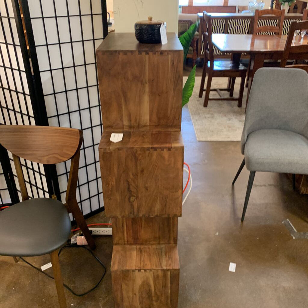 Wooden step stool in a room with chairs and a table
