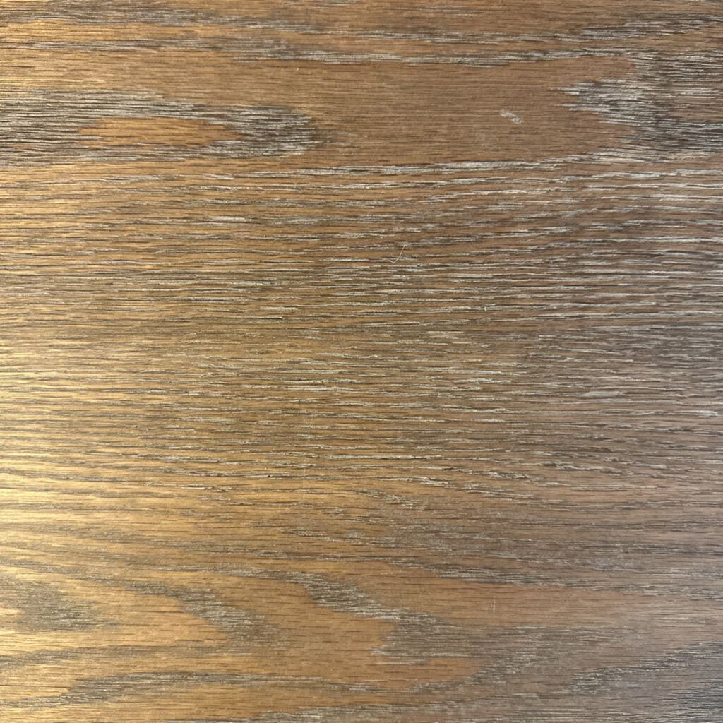 Close-up of a wooden surface with a natural grain pattern