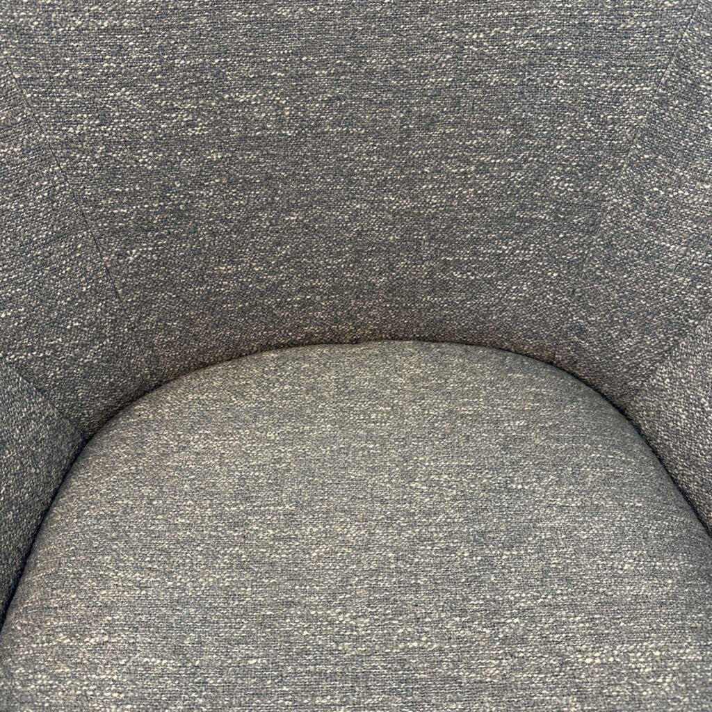 Close-up of a textured gray fabric surface