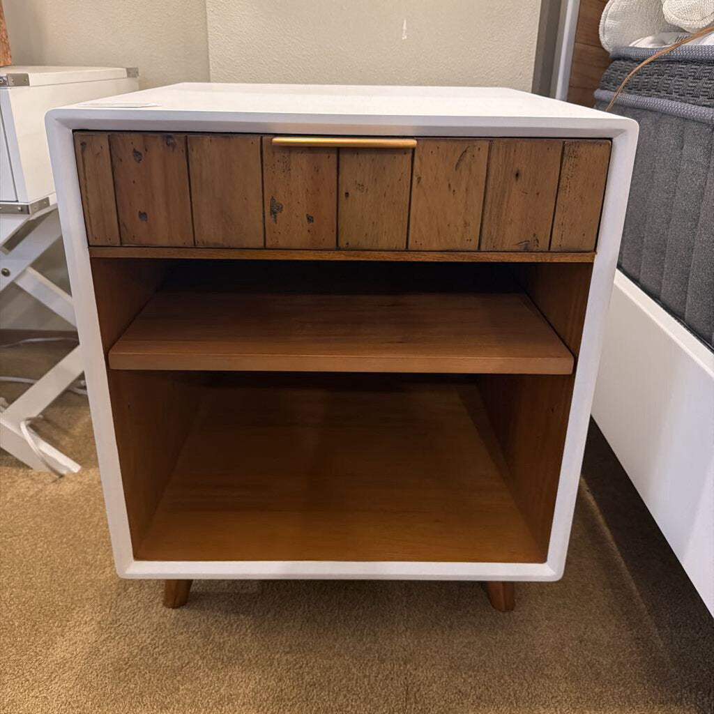 Wooden shelf with white frame in a room setting