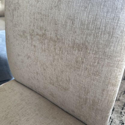 Close-up of a textured beige fabric surface
