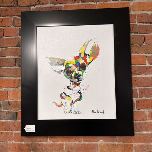 Framed colorful dog illustration on a brick wall