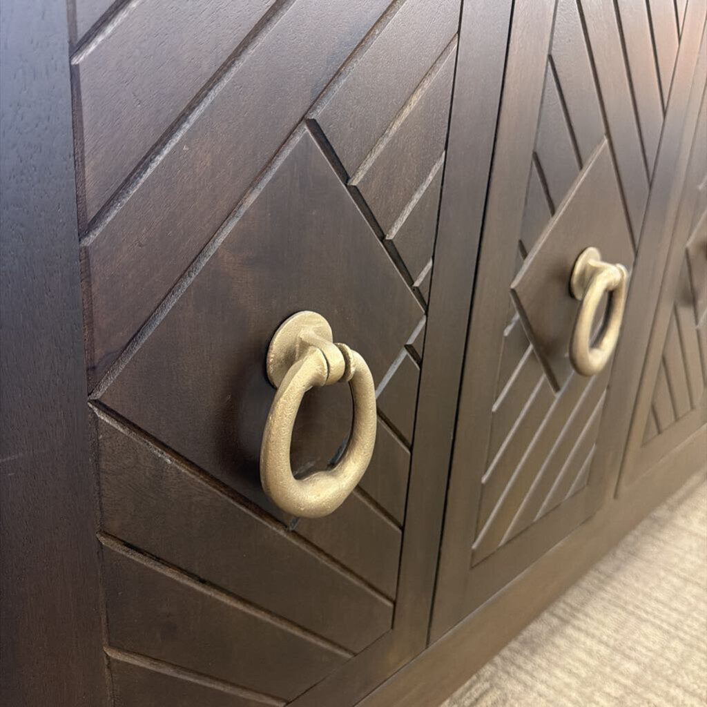 Wooden cabinet with geometric pattern and brass handles