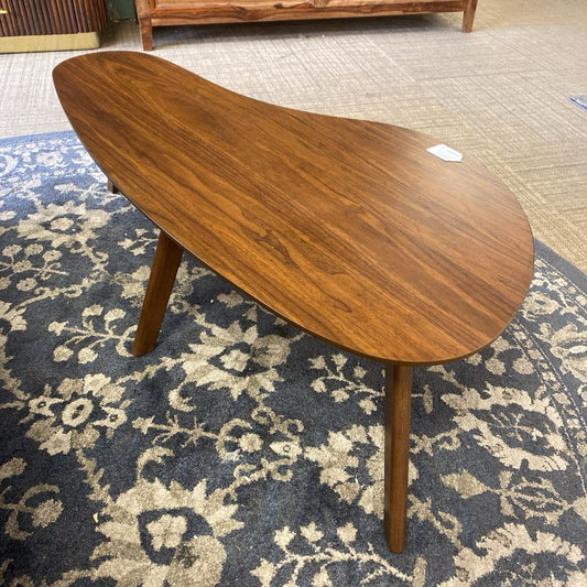 Wooden coffee table on a patterned rug