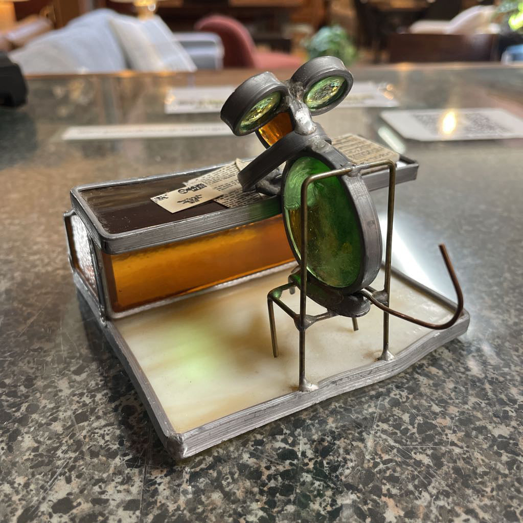 Metal Bug-Guy in His Office