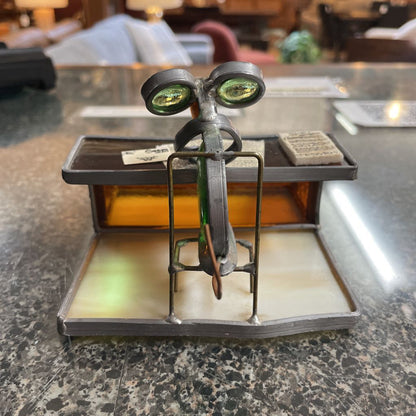 Metal Bug-Guy in His Office