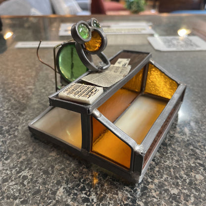 Metal Bug-Guy in His Office