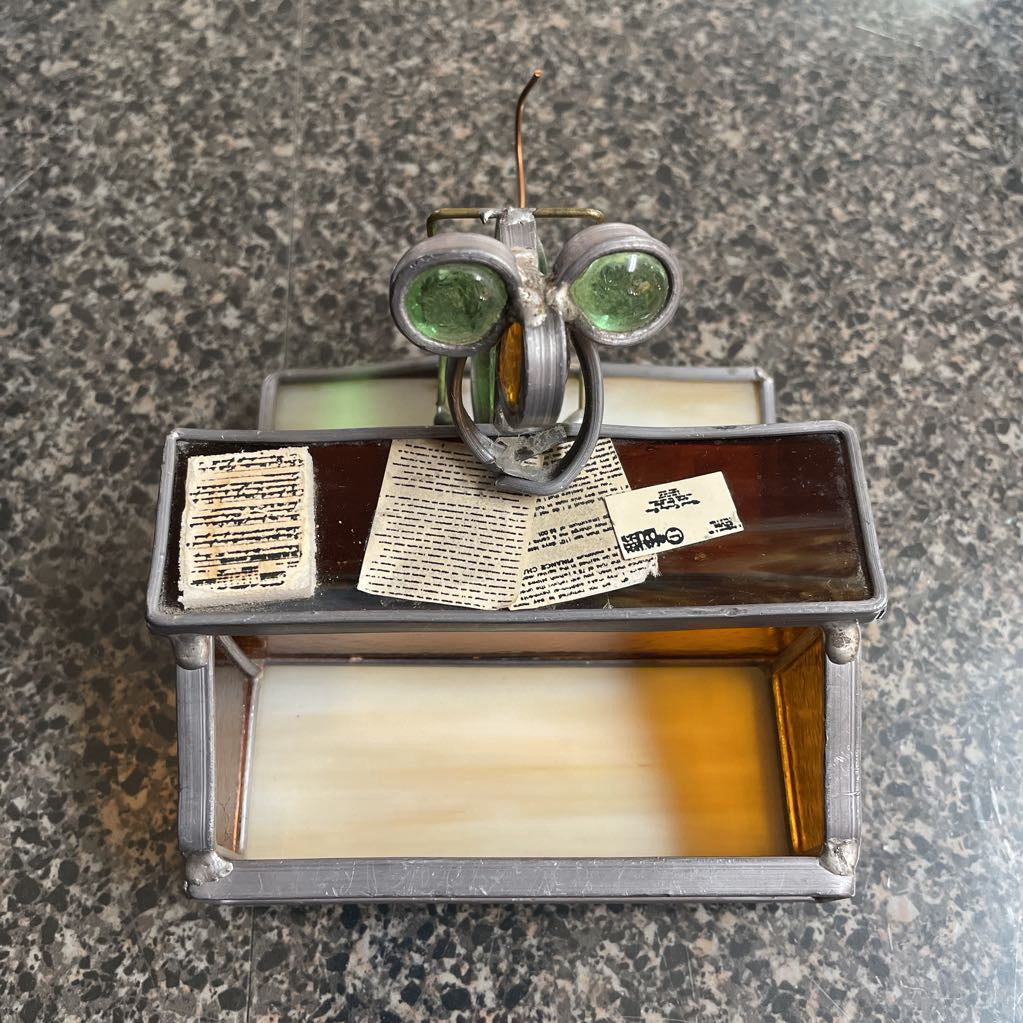 Metal Bug-Guy in His Office