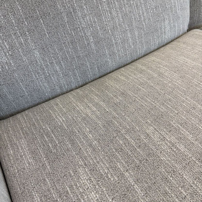 Close-up of a textured gray fabric surface