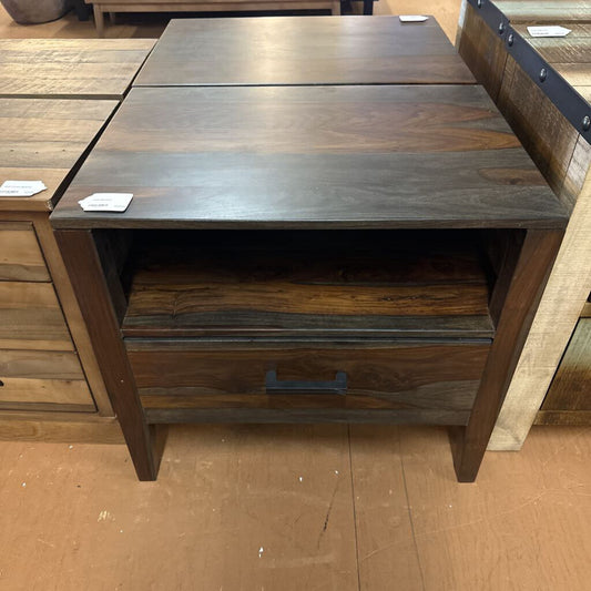 Wooden nightstand with two drawers in a store setting