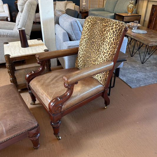 Chair with leopard print backrest in a furniture store setting