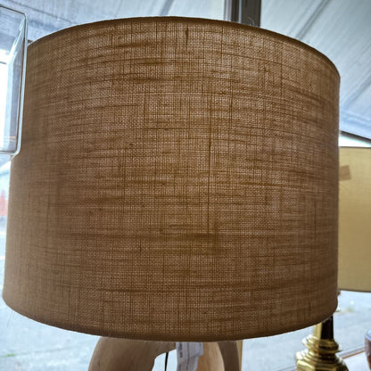 Close-up of a brown textured lampshade with a blurred background