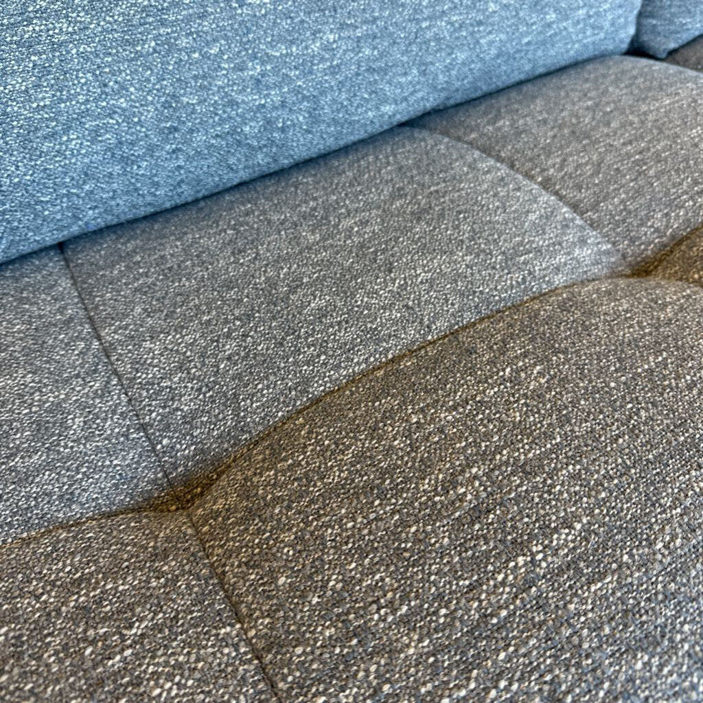 Close-up of different shingle colors including blue, gray, and brown.