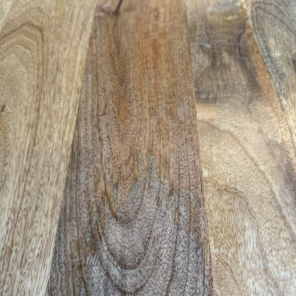 Close-up of a wooden surface with visible grain and texture