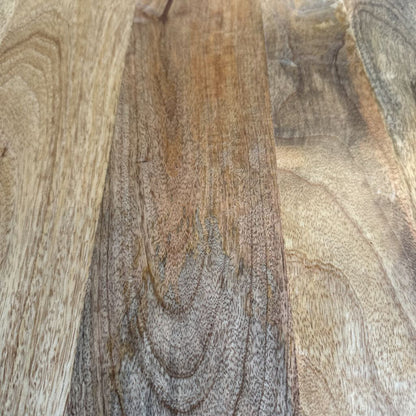 Close-up of a wooden surface with visible grain and texture