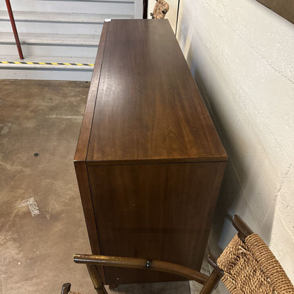 Wooden cabinet in a storage or warehouse setting